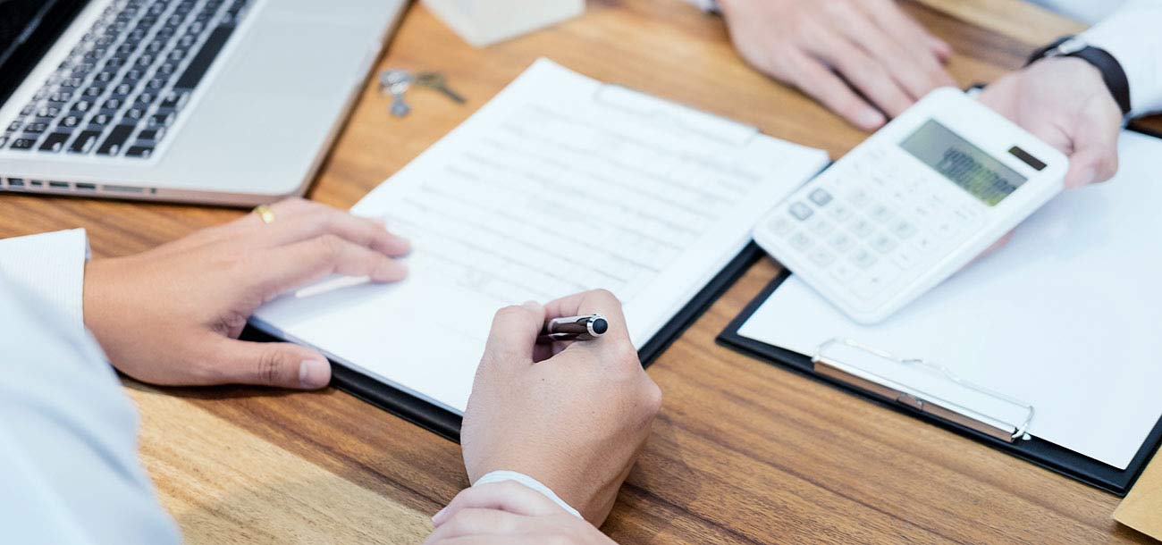 man-filling-out-business-loan-application